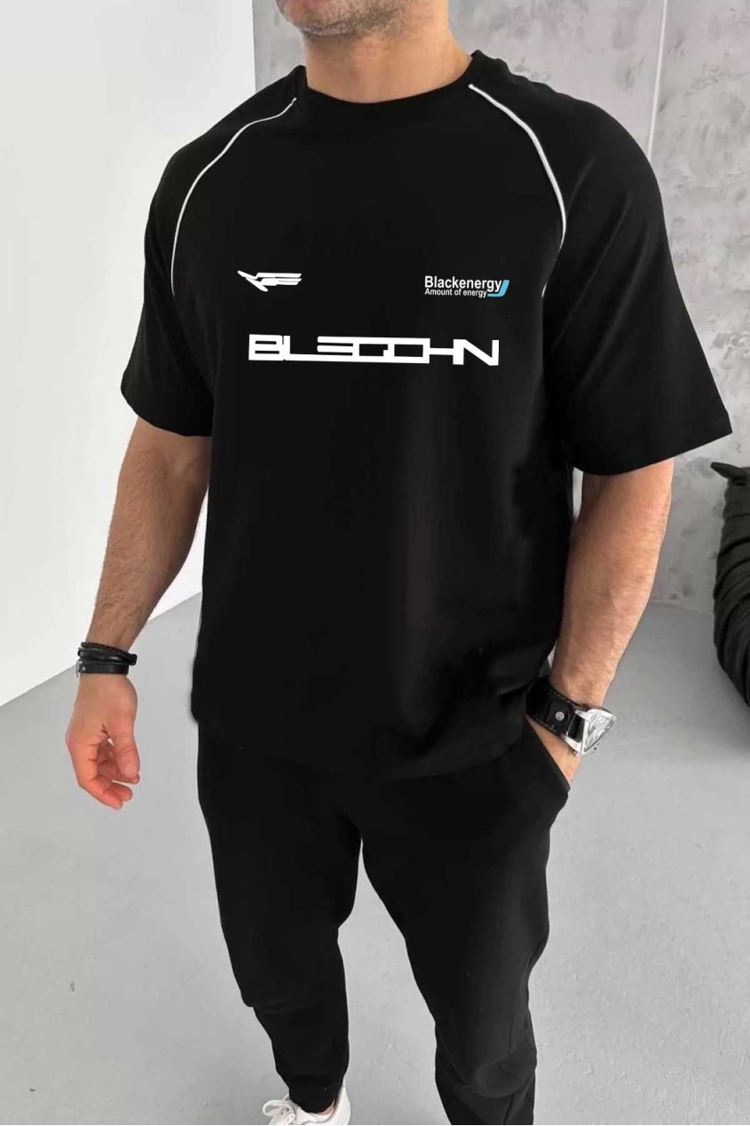 Siyah Oversize Arabiyeli Black Energy Baskılı Bisiklet Yaka Penye T-Shirt Siyah Oversize Arabiyeli Black Energy Baskılı Bisiklet Yaka Penye T-Shirt